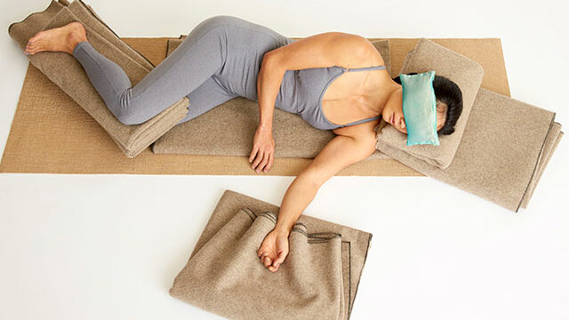relax and renew restorative yoga side savasana